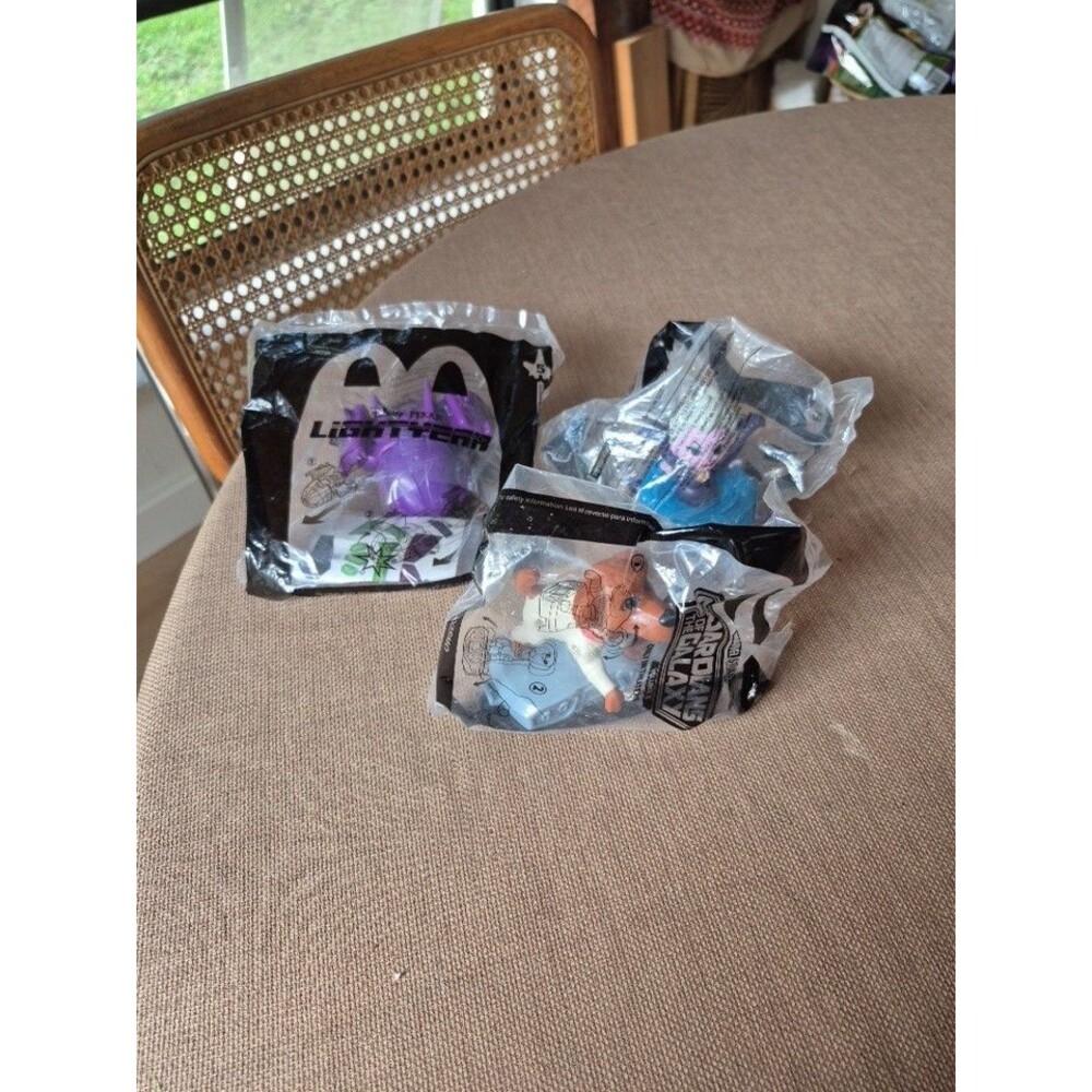 Unopened McDonald’s Premium 3 Lot Pixar Light Year, Lil Mermaid Guardian Galaxy